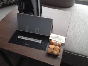 a table with a sign and a package of cookies