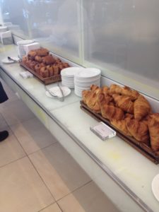 a buffet table full of pastries