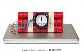 a laptop with a clock on top of it