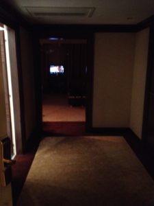 a hallway with a rug