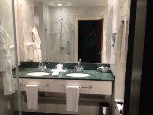 a bathroom with a mirror and sinks