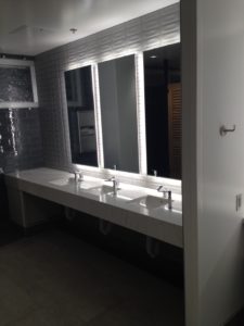 a row of sinks in a bathroom
