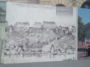 a drawing of a town on a wall