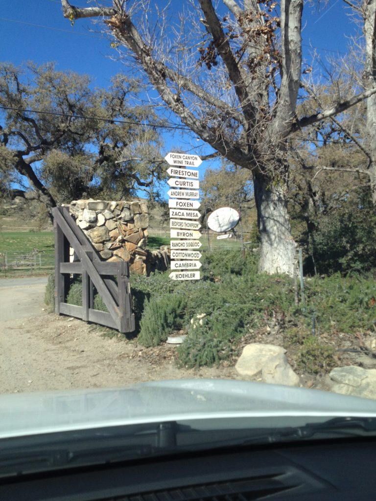a sign post with many directions