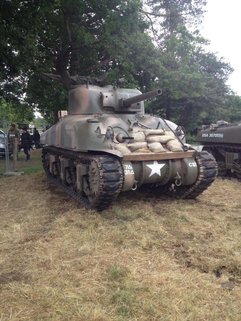 a military tank on grass